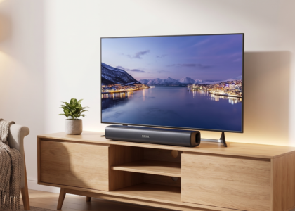 Person-watching-movie-on-TV-with-RIOWOIS-soundbar-for-clear-dialogue-sound
